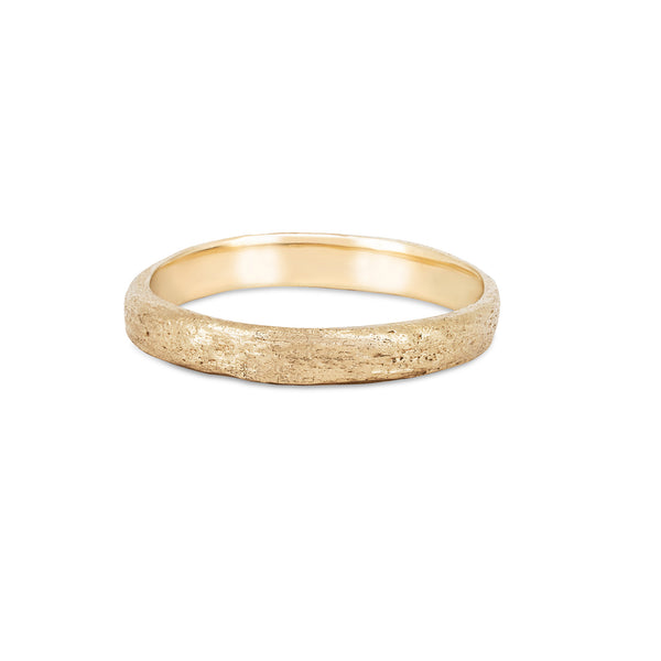 Front view of the Driftwood 14k Gold Slim Wedding Band, featuring a narrow, textured bark finish.