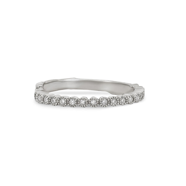 Front view of the Hawthorn Diamond Eternity Ring in 14k white gold, featuring a continuous line of diamonds set on a textured twig band.