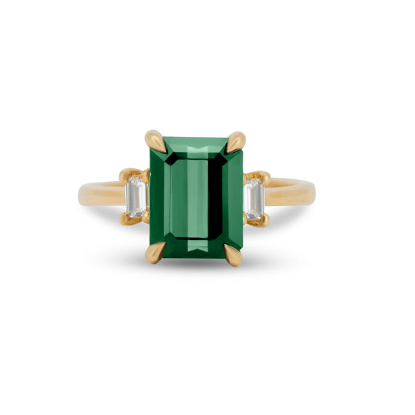 Front view of the Hero 1.8ct Green Tourmaline & Diamond Ring in 14k polished gold, featuring a green tourmaline center stone and two small side diamonds.