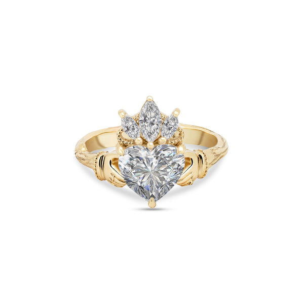 Front view of the Claddagh Heart Cut Diamond Engagement Ring in 14k solid gold, showcasing a heart-shaped center diamond and three-stone crown detail.