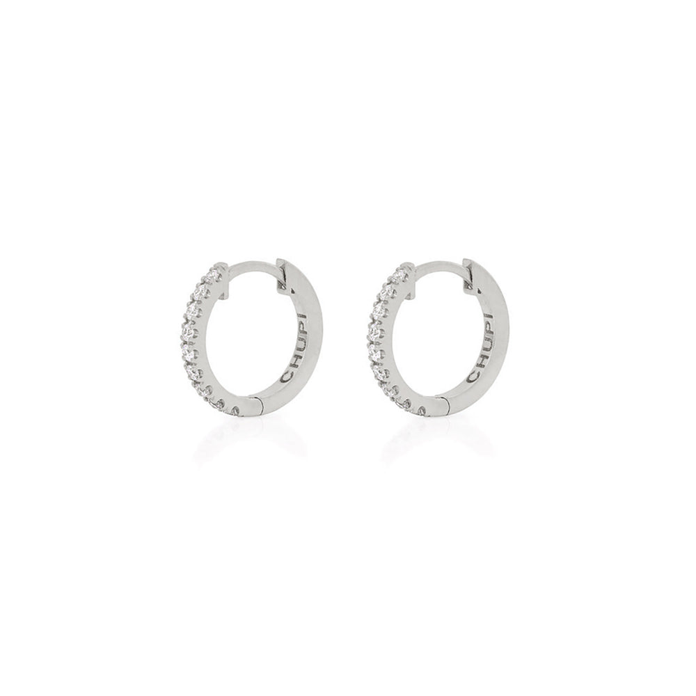 Front view of the Today Diamond Eternity Huggies in 14k white gold, small hoop earrings set with diamonds.