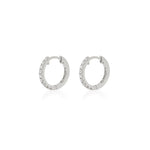 Thumbnail of Front view of the Today Diamond Eternity Huggies in 14k white gold, small hoop earrings set with diamonds.