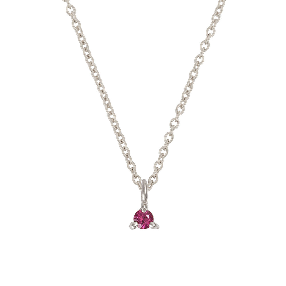Front view of the Lucky Star Birthstone Necklace in 14k white gold, featuring a Garnet birthstone set in a star pendant.