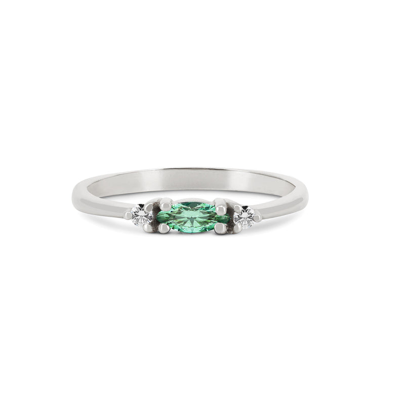 Front view of the Daydreamer Marquise Emerald & Diamond Ring in 14k polished white gold, featuring a marquise-cut emerald flanked by two smaller diamonds on a polished band.