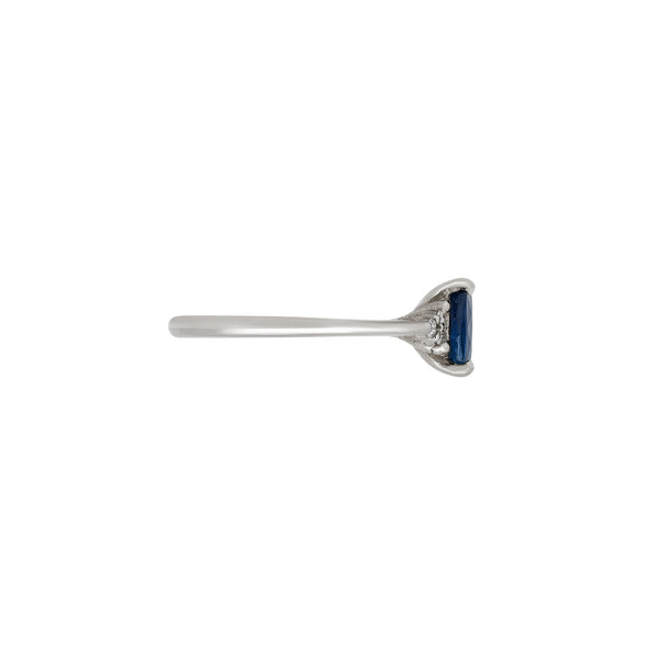 Alternative view of Side profile of the Dewlight Blue Sapphire Engagement Ring in 14k white gold, showing the polished band and elevated setting of the blue sapphire.