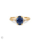 Front view of the Dewlight Blue Sapphire Engagement Ring in 14k solid gold, featuring a large oval blue sapphire on a twig band.