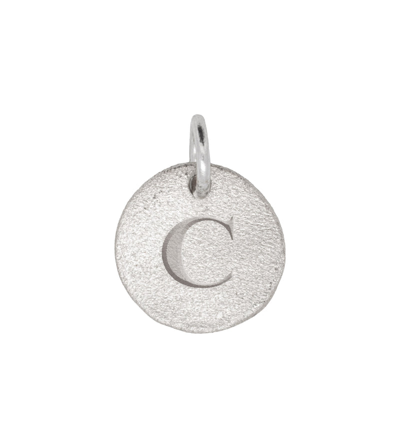 Close-up of the Individual Letter Disc in 14k white gold, engraved with the letter 'C' on a polished circular pendant.
