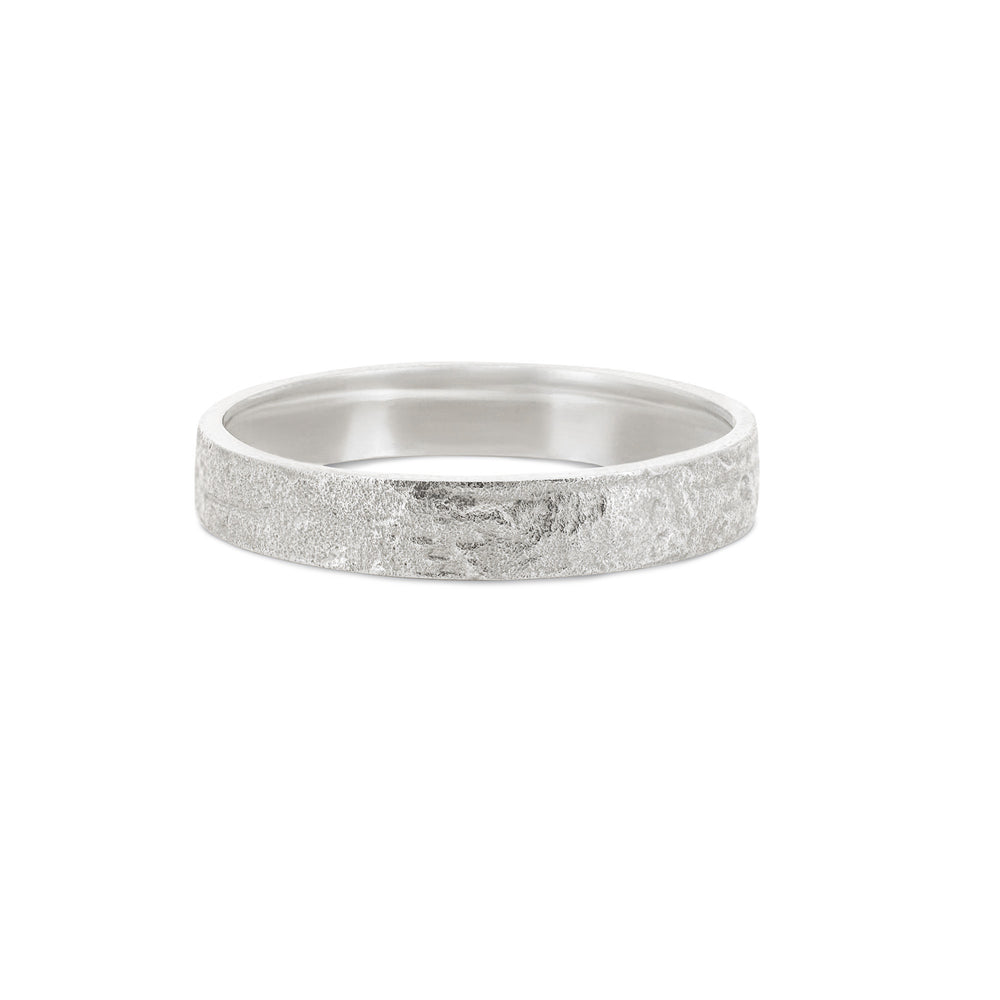 Front view of the Driftwood 4mm Wedding Band in 14k white gold, featuring a textured, polished band.
