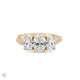 Front view of the Guiding Light Trilogy 2ct Oval Diamond Engagement Ring in 14k solid gold with a twig band, featuring a central oval diamond flanked by two smaller diamonds.