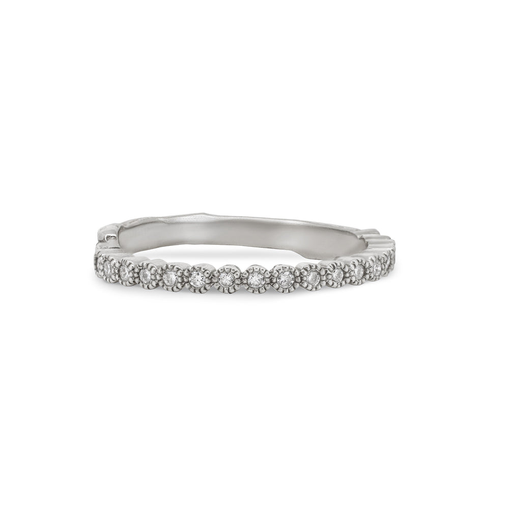 Front view of the Hawthorn Diamond Eternity Ring in 14k white gold, featuring a continuous line of diamonds set on a textured twig band.