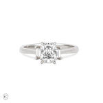 Front view of the Hero Radiant Cut Three Stone Diamond Engagement Ring in 14k white gold, featuring a central 1ct radiant-cut diamond flanked by two smaller diamonds on a polished band.