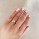 Close-up of a hand wearing the North Star Lab Grown Diamond Original Signet Ring in 14k solid gold.