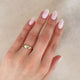 Close-up of a hand wearing the North Star Lab Grown Diamond Tiny Signet Ring in 14k white gold.