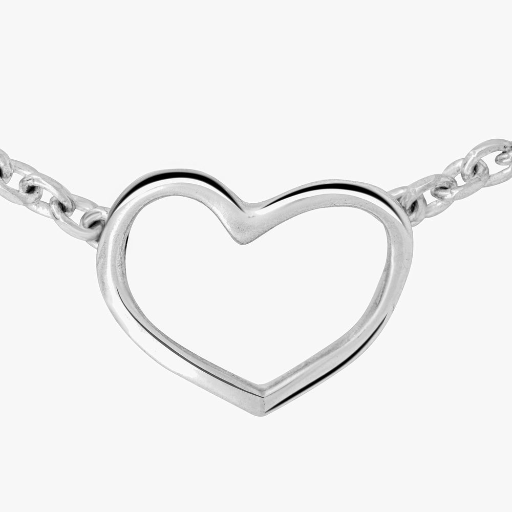 Front view of the Sterling Silver Love Heart Necklace, featuring a delicate heart-shaped pendant on a fine chain.