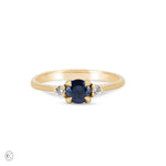Front view of the Love is All Blue Sapphire Engagement Ring in 14k solid gold, featuring a blue sapphire on a polished band.