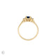 Top-down view of the Love is All Blue Sapphire Engagement Ring in 14k solid gold, highlighting the central blue sapphire stone.