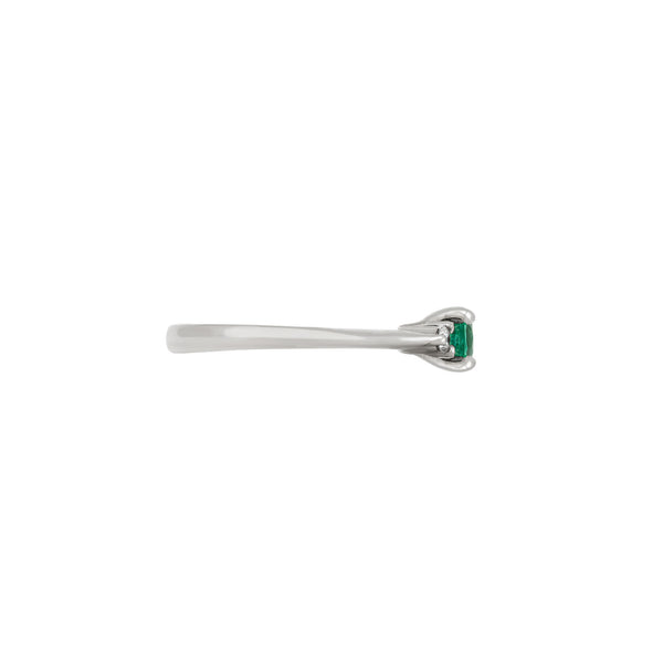 Alternative view of Side profile of the Love is All Emerald Engagement Ring in 14k white gold, showing the polished band and elevated setting of the emerald.