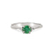 Front view of the Love is All Emerald Engagement Ring in 14k white gold with a twig band, featuring an brilliant cut emerald.