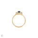 Top-down view of the Love is All Blue Sapphire Engagement Ring in 14k solid gold, highlighting the central blue sapphire and twig band.