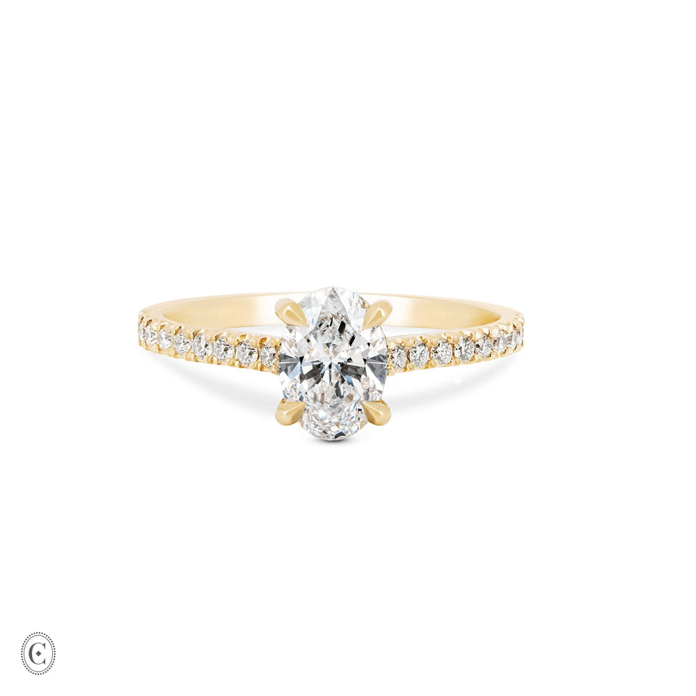 Front view of the Moonlight Eternity 1ct Oval Diamond Engagement Ring in 14k solid gold, featuring an oval diamond with an eternity-set band.