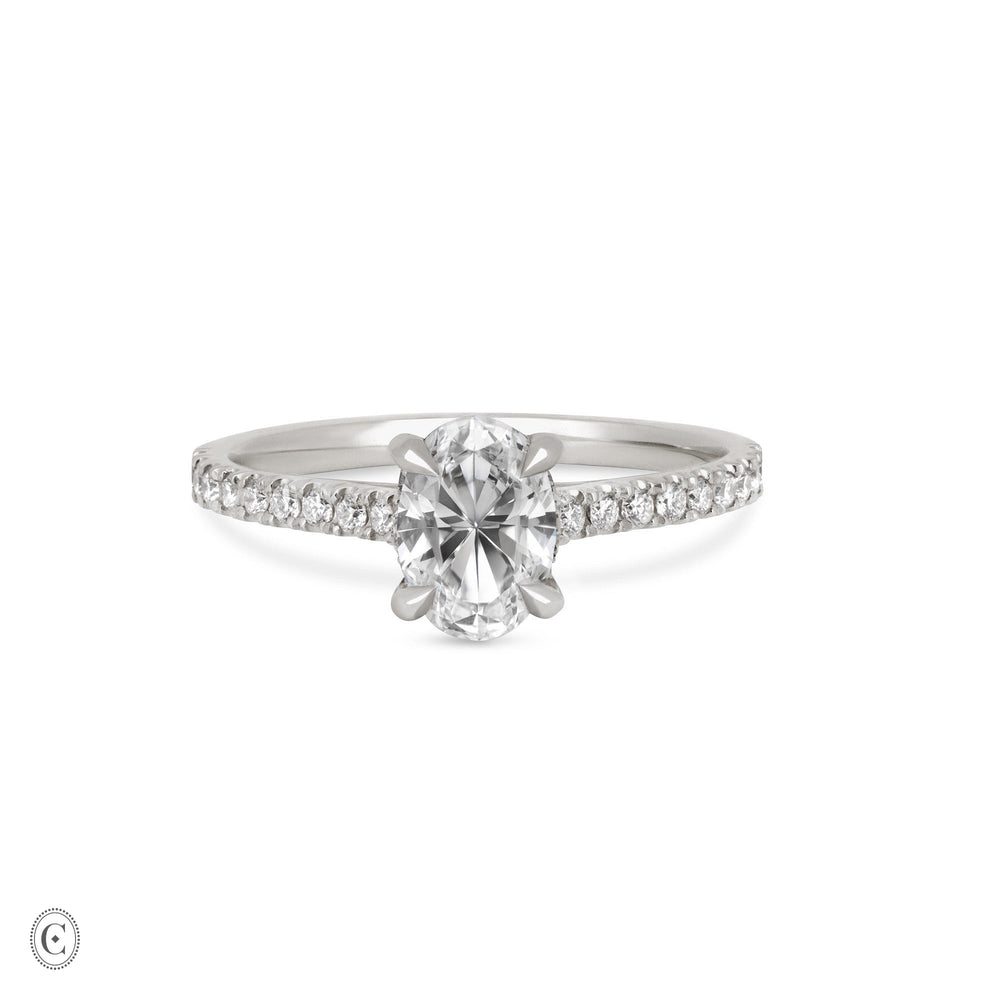 Front view of the Moonlight Eternity Oval Diamond Engagement Ring in 14k white gold, featuring an oval diamond with an eternity-set band.