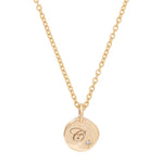 Thumbnail of Front view of the North Star Diamond Engraved Initial Necklace in 14k gold, featuring an engraved disc pendant with a small diamond.