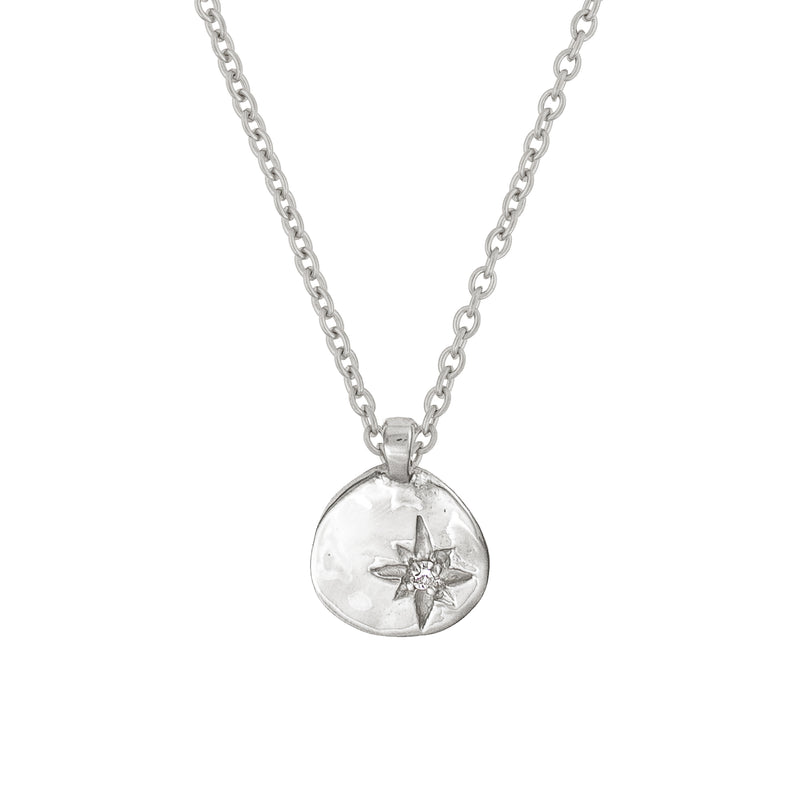 Front view of the North Star Diamond Necklace in 14k white gold, featuring a small diamond-set star pendant.