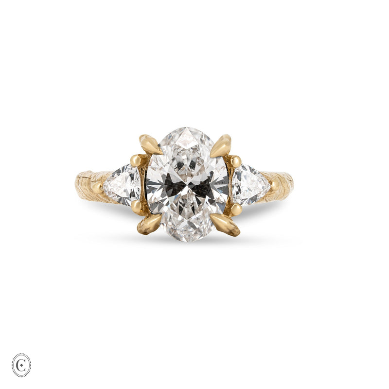 Front view of the One in a Trillion 2.4ct Lab-Grown Oval Diamond Engagement Ring in 14k gold with a twig band.