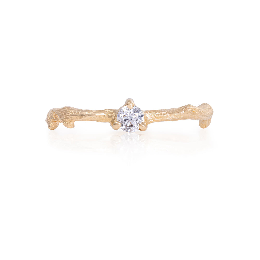 Front view of the Promise Me Diamond Ring in 14k gold with a twig band, featuring a single, round-cut diamond.