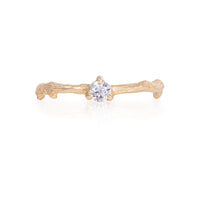 Front view of the Promise Me Diamond Ring in 14k gold with a twig band, featuring a single, round-cut diamond.