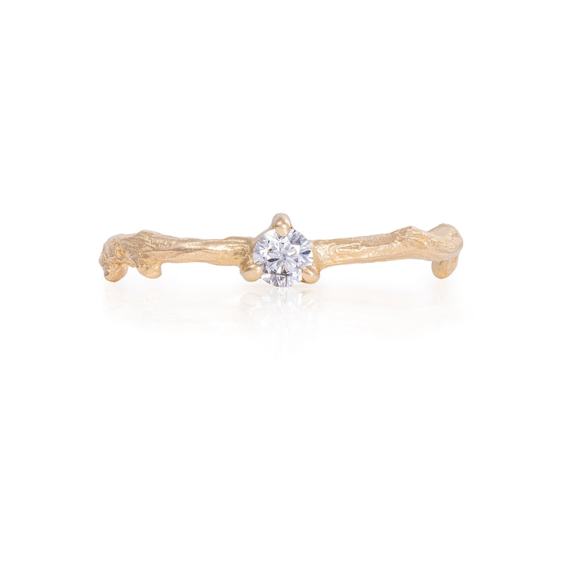 Front view of the Promise Me Diamond Ring in 14k gold with a twig band, featuring a single, round-cut diamond.