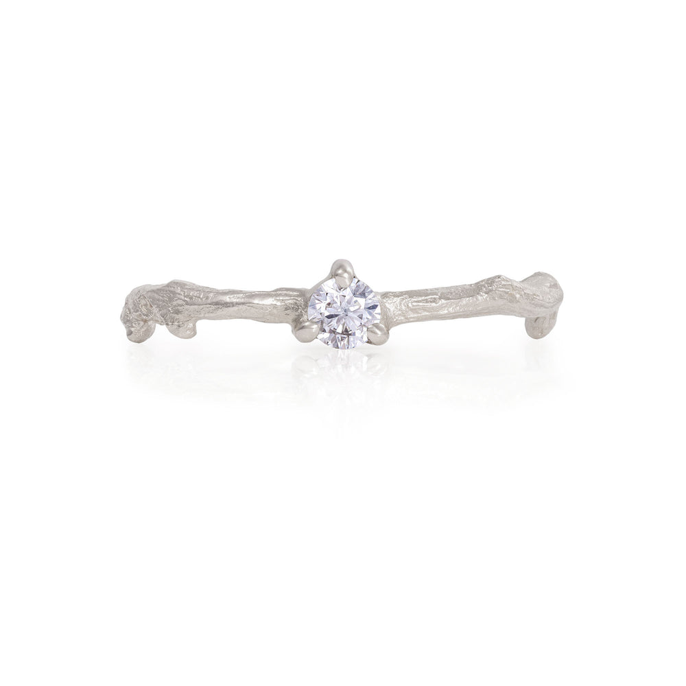 Front view of the Promise Me Diamond Ring in 14k white gold with a twig band, featuring a single, round-cut diamond.