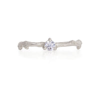 Front view of the Promise Me Diamond Ring in 14k white gold with a twig band, featuring a single, round-cut diamond.