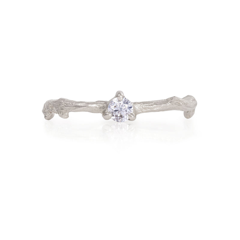Front view of the Promise Me Diamond Ring in 14k white gold with a twig band, featuring a single, round-cut diamond.