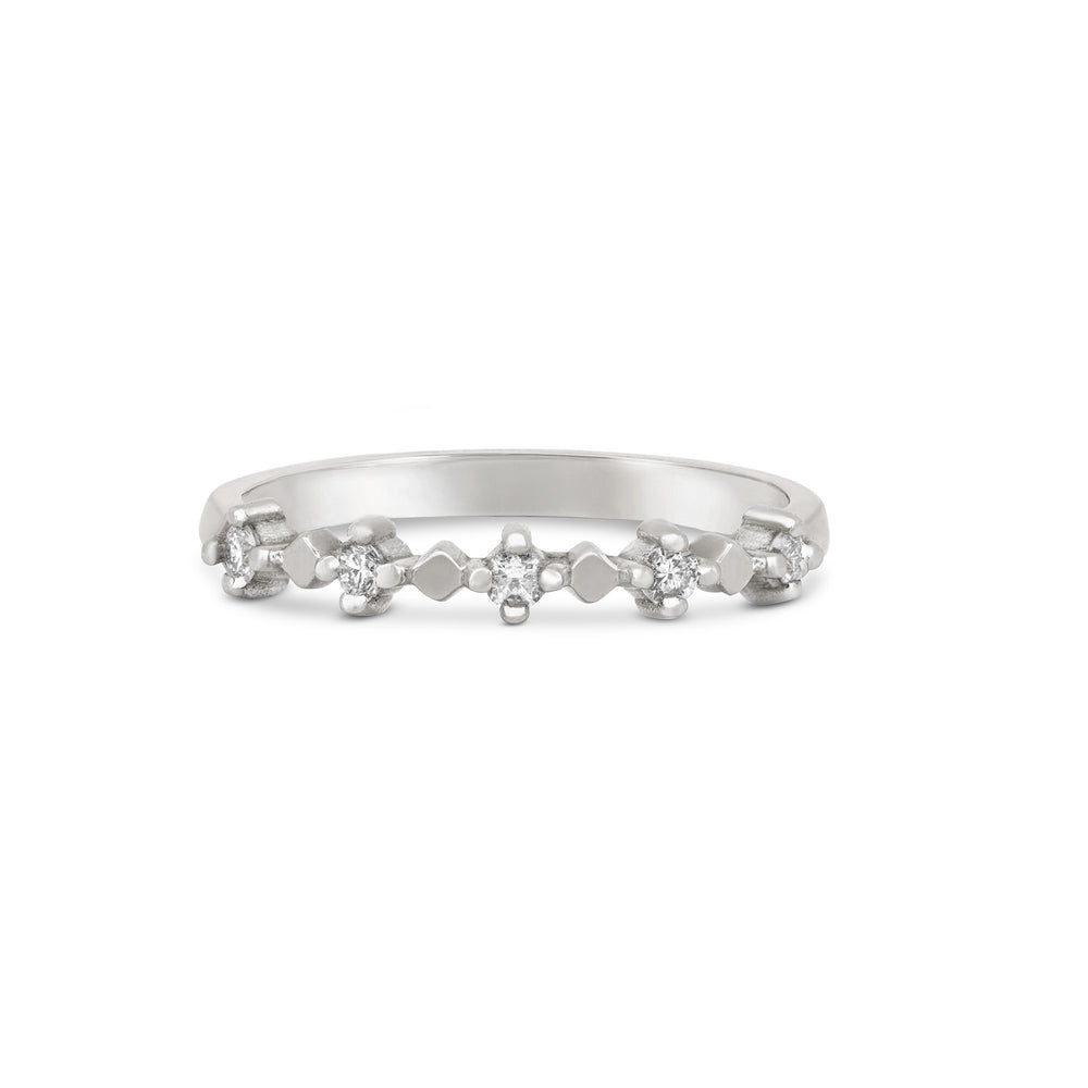Front view of the Stars in the Sky Five Diamond Eternity Ring in 14k white gold, with a polished band and five scattered diamonds.