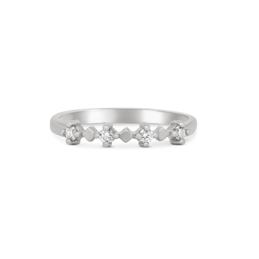 Front view of the Stars in the Sky Four Diamond Eternity Ring in 14k white gold, with a polished band and four scattered diamonds.