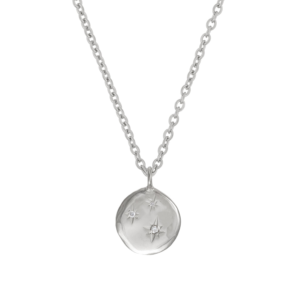 Front view of the Stars in the Sky Three Diamond Necklace in 14k white gold, featuring three scattered diamonds on a round pendant.