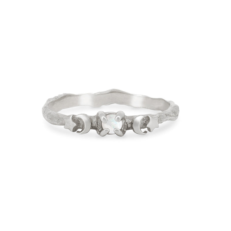 Front view of the Sun, Moon & Stars Opal Ring in 14k white gold, featuring a central opal with celestial motifs on a twig band.