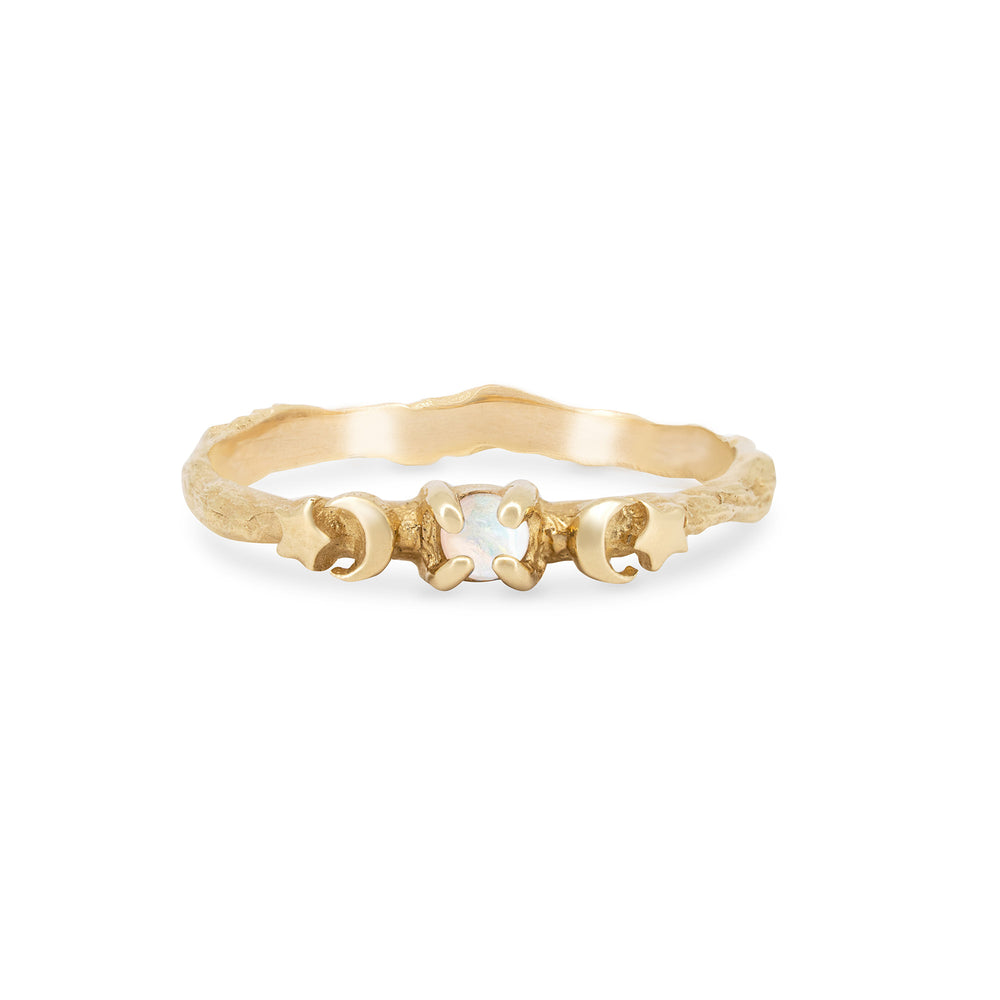 Front view of the Sun, Moon & Stars Opal Ring in 14k solid gold, featuring a central opal with celestial motifs on a twig band.