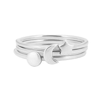 Thumbnail of Front view of the Sterling Silver Sun, Moon & Star Ring Stack, showcasing three delicate, polished sterling silver rings with a sum, moon and star.