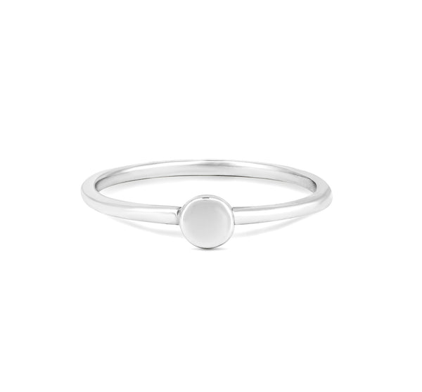 Front view of the Sterling Silver Sun Ring, a delicate polished band with a small sunburst motif.