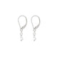 Angled view of the Teardrop Diamond Earrings in 14k white gold, showcasing the delicate setting and white gold post.