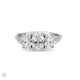 Front view of the Guiding Light Trilogy Oval Diamond Engagement Ring in 14k white gold with a twig band, featuring a central oval diamond flanked by two smaller diamonds.