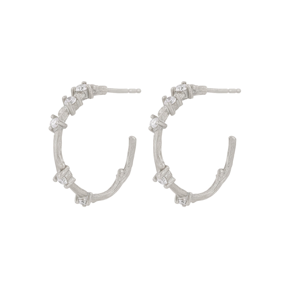 Front view of the Whispered Dreams Diamond Hoop Earrings in 14k white gold, featuring a twig-textured gold hoop.