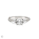 Front view of the You, Me & Magic Round Cut Three Stone Engagement Ring in 14k white gold with a twig band, featuring a 0.7ct central round cut diamond flanked by two smaller stones.