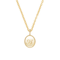 Thumbnail of Always Remember Engraved Necklace by Chupi in 14k solid gold with a polished oval pendant featuring a hand-engraved script initial on a fine chain.