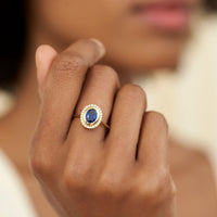 On-body shot of Luna - 14k Polished Gold Oval Halo Sapphire and Diamond Ring