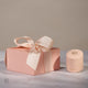 Chupi luxury packaging box, a blush pink box with a subtle logo.