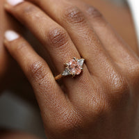 On-body shot of One in a Trillion 2ct Lab-Grown Oval Pink Diamond Engagement Ring - 14k Gold Twig Band