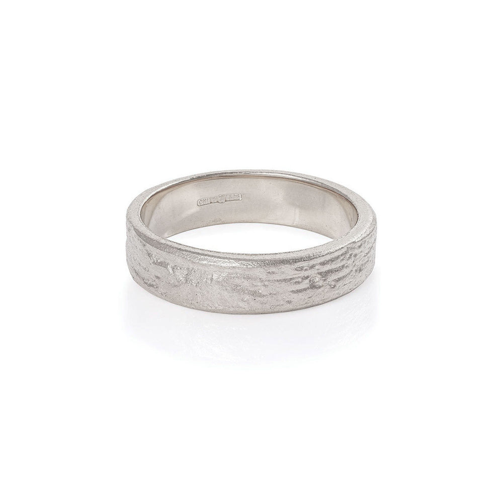 Front view of the Driftwood Men's Wide Wedding Band in 14k white gold, featuring a bold, textured driftwood finish.